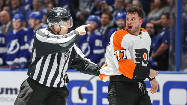 Philadelphia Flyers defenseman Tony DeAngelo (77) reacts after a penalty during a game against the Tampa Bay Lightning